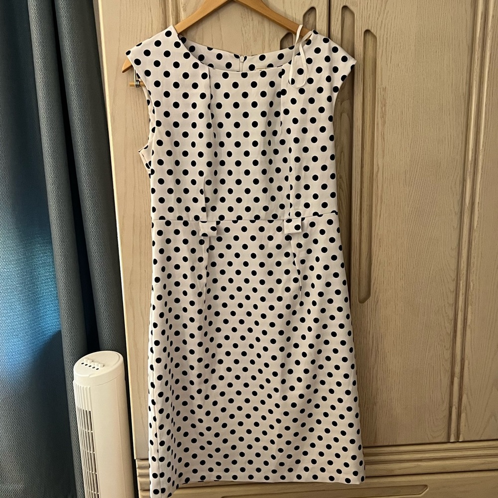 White fitted dress with black polka-dots